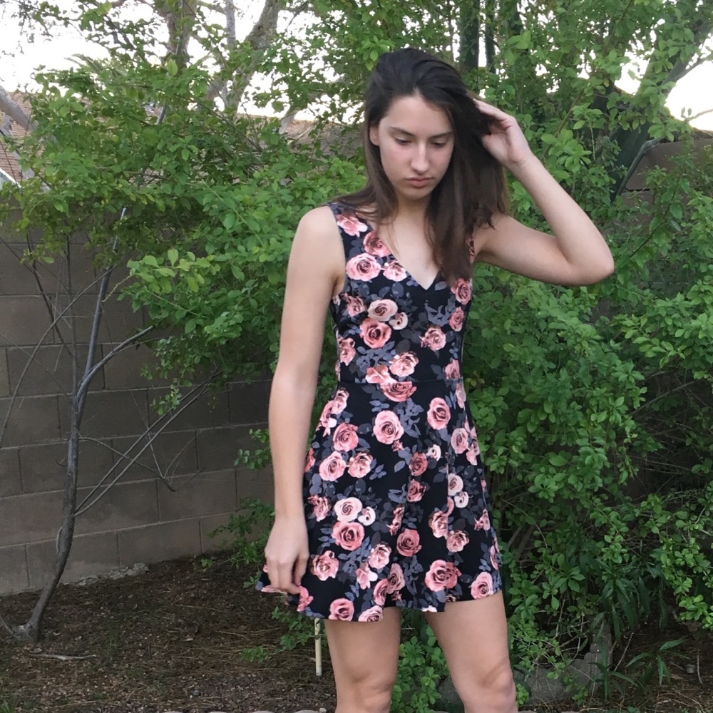 Statement black mini dress with pink roses